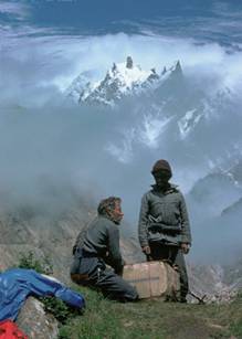 Members of K2 Expedition, Members of an expedition open a box on K2. K2 stands at a height of 8611 meters, and is the second highest mountain in the world. It stands in the Kakorum Range of the Western Himalayas, on the border of China, Jammu and Kashmir., © Galen Rowell/CORBIS, RM, 2, Asia, Asia, Central Asia, China, Climber, Expedition, Exploration, K2, Karakoram Range, Kashmir, Landforms, Mountain, Mountaineer, Natural world, Northern Areas, Pakistan, People