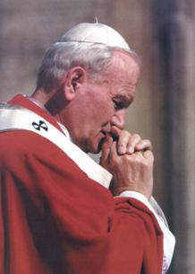 Pope John Paul II In Prayer.jpg